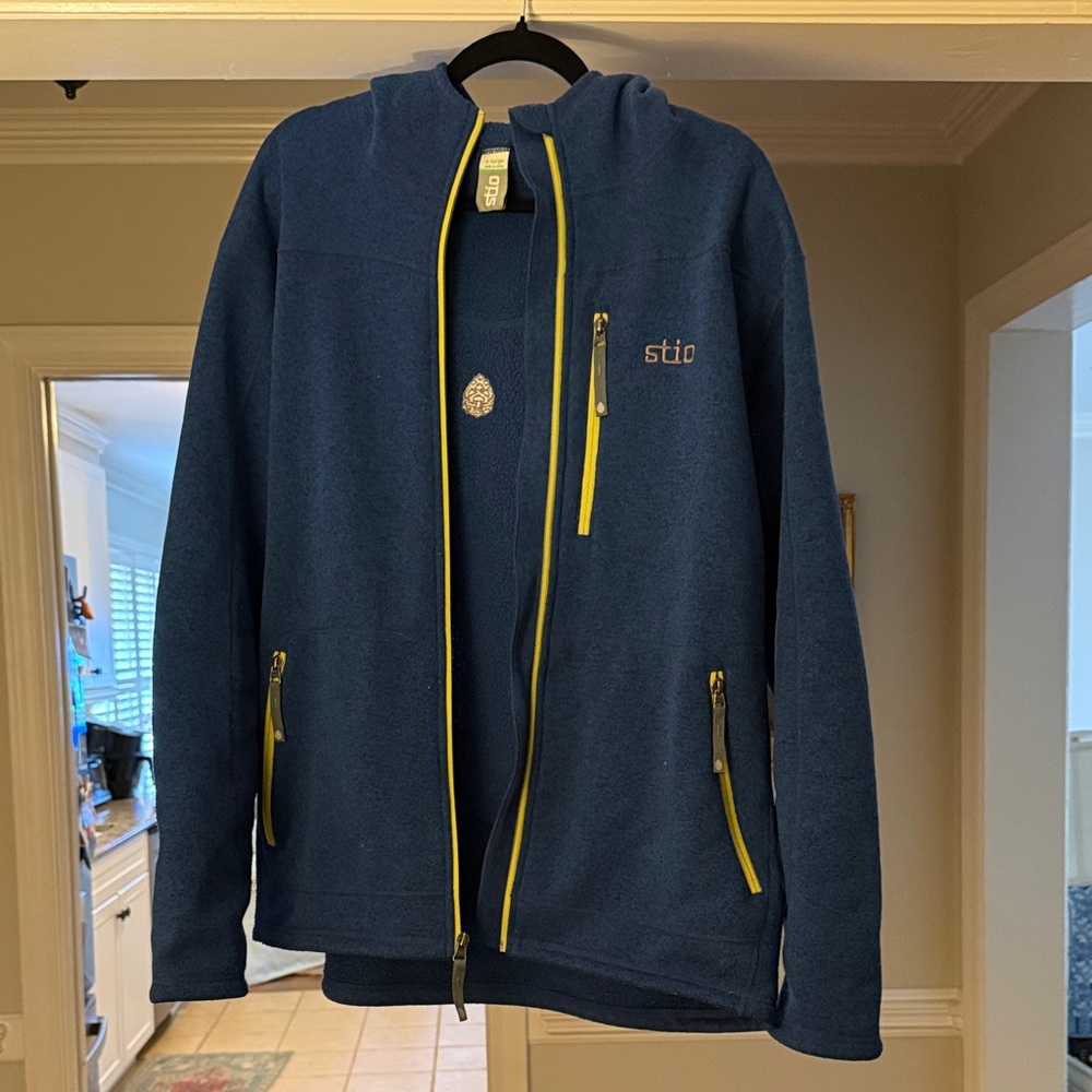 Stio Wilcox Hooded Fleece Jacket in Deep Blue with Bright Yellow Zippers